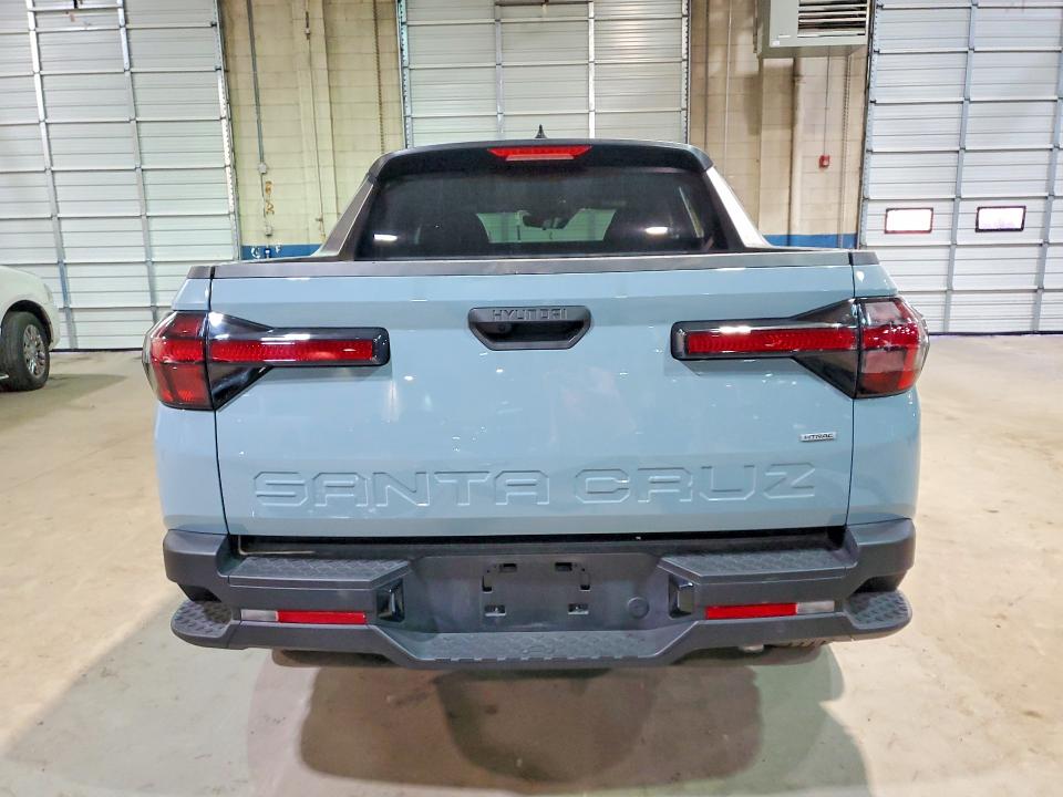 2024 Hyundai Santa cruz VIN 5NTJBDDE1RH111427 COPART salvage auction — SIDE, MI - CERT OF TITLE-SALVAGE VEHICLE, sold $8,600 on 2026-07-10 (photo 6)