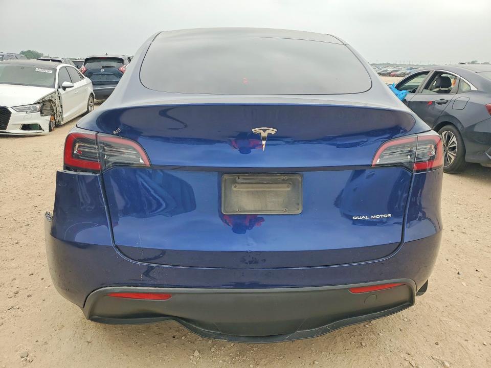 2023 Tesla Model y VIN 7SAYGAEE4PF700515 COPART salvage auction — ALL OVER, Tx - Salvage Vehicle Title, sold $3,350 on 2026-07-16 (photo 6)