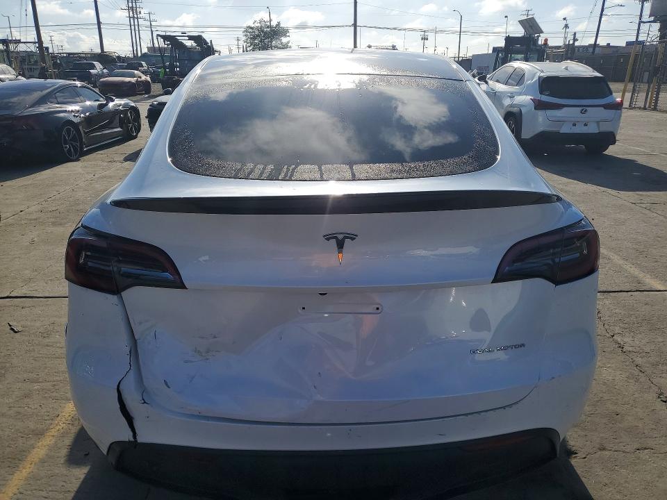 2023 Tesla Model y VIN 7SAYGDEE0PA052489 COPART salvage auction — REAR END, Ca - Salvage Certificate, sold $14,300 on 2026-07-29 (photo 6)