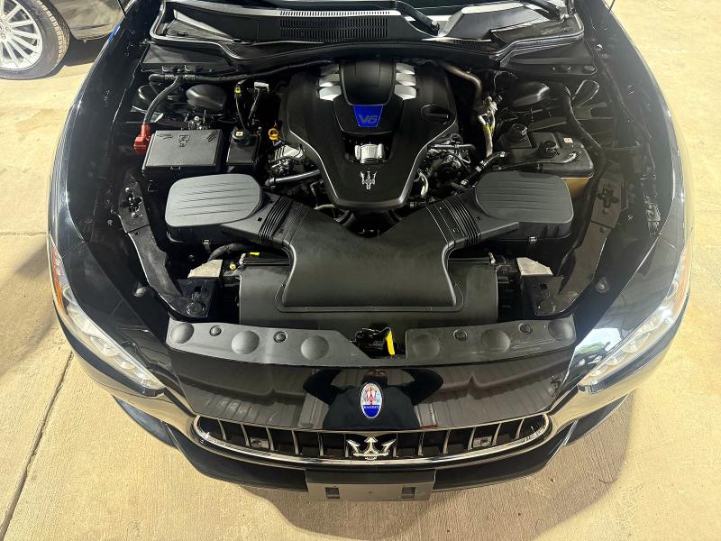 2014 Maserati Ghibli VIN ZAM57RTA9E1112724 COPART salvage auction — DAMAGE HISTORY, Co - Salvage Title (P), sold $17,600 on 2026-07-10 (photo 7)