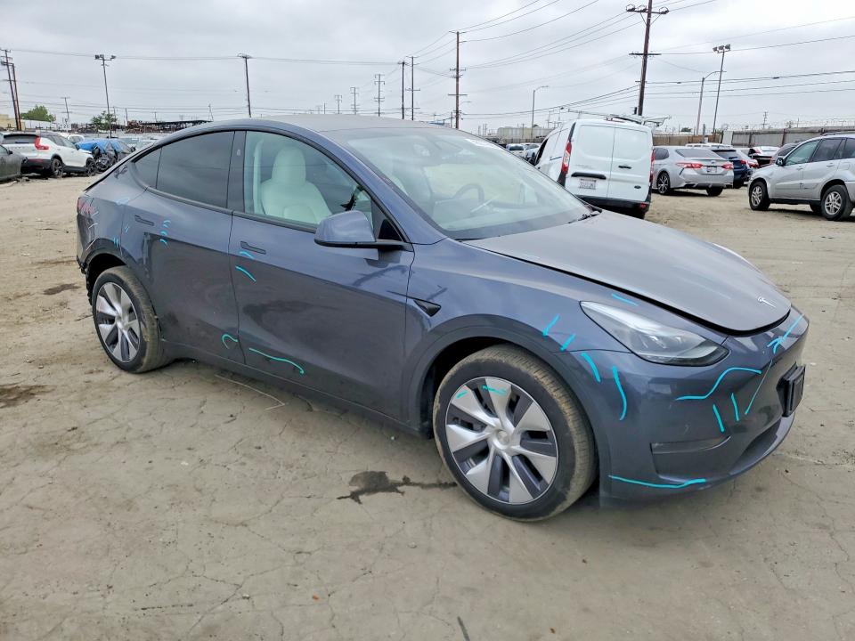 2023 Tesla Model y VIN 7SAYGDEE1PA198593 COPART salvage auction — REAR END, Ca - Salvage Certificate, sold $13,100 on 2026-07-09 (photo 4)