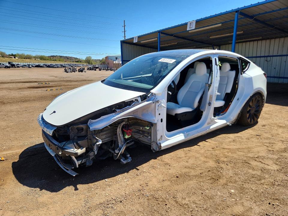 2023 Tesla Model y VIN 7SAYGDEF6PF936786 COPART salvage auction — SIDE, Co - Salvage Title, sold $11,100 on 2026-07-06 (photo 1)