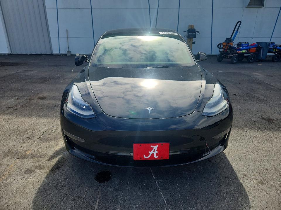 2023 Tesla Model 3 VIN 5YJ3E1EC2PF582671 COPART salvage auction — SIDE, FL, sold $7,900 on 2026-07-27 (photo 5)