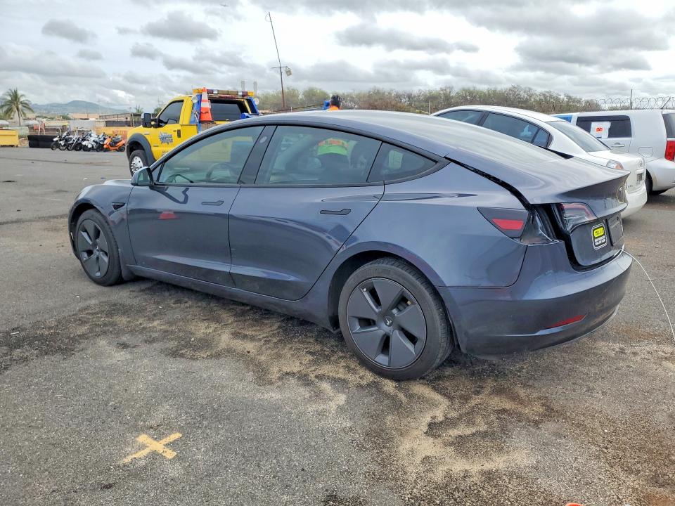 2023 Tesla Model 3 VIN 5YJ3E1EA4PF559438 COPART salvage auction — REAR END, Hi - Certificate Of Salvage, sold $2,150 on 2026-08-31 (photo 2)