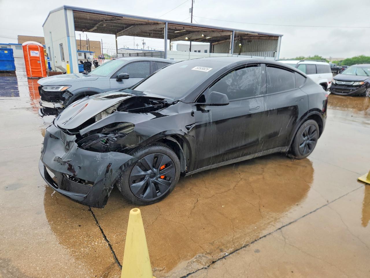 2025 Tesla Model Y VIN 7SAYGDEE9SA344604 COPART salvage auction — Front End, TX - SALVAGE VEHICLE TITLE, sold $9,900 on 2026-07-09 (photo 1)