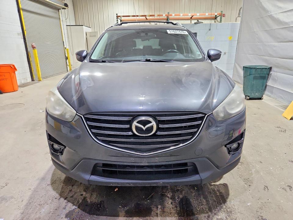 2016 Mazda Cx-5 VIN JM3KE4DY1G0795935 COPART salvage auction — SIDE, Nh - Cert Of Title-Salvage, sold $2,200 on 2026-07-28 (photo 5)