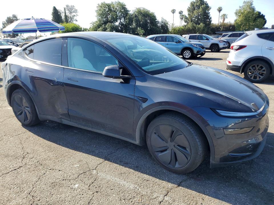 2026 Tesla Model y VIN 7SAYGDEE9TF371368 COPART salvage auction — REAR END, Salvage Title, sold $16,800 on 2026-07-21 (photo 4)