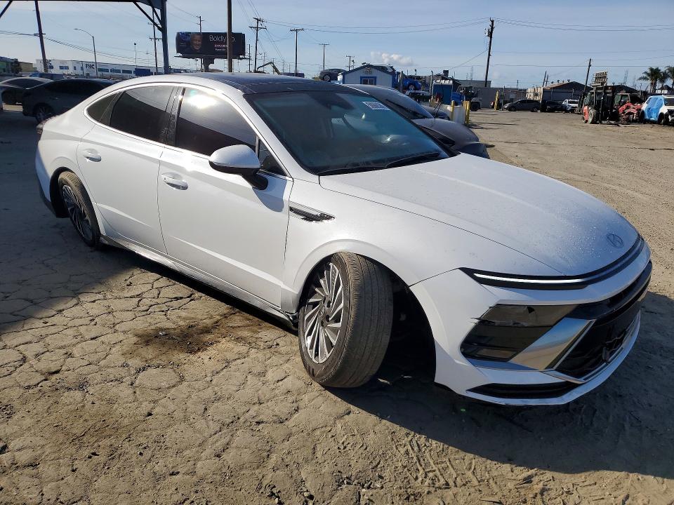 2026 Hyundai Sonata VIN KMHL34JJ5TA139957 COPART salvage auction — SIDE, Salvage Title, sold $6,600 on 2026-07-23 (photo 4)