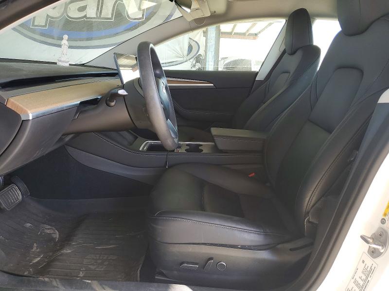 2023 Tesla Model 3 VIN 5YJ3E1EA8PF573648 COPART salvage auction — REAR END, Salvage Title, sold $8,700 on 2026-08-20 (photo 7)