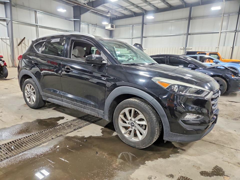 2016 Hyundai Tucson VIN KM8J3CA48GU101302 COPART salvage auction — VANDALISM, Mn - Cert Of Title-Prior Salvage, sold $2,550 on 2026-07-14 (photo 4)