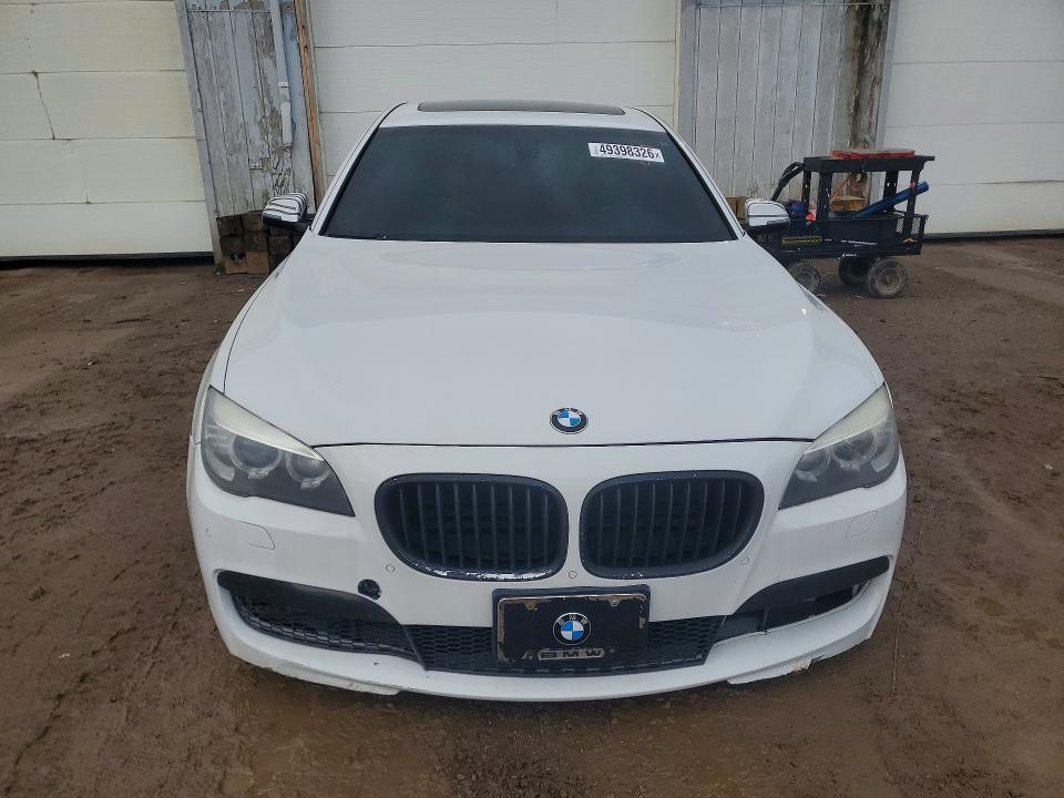 2014 BMW 7 series VIN WBAYE8C59ED135551 COPART salvage auction — UNDERCARRIAGE, Mi - Certificate Of Title, sold $1,650 on 2026-07-22 (photo 5)