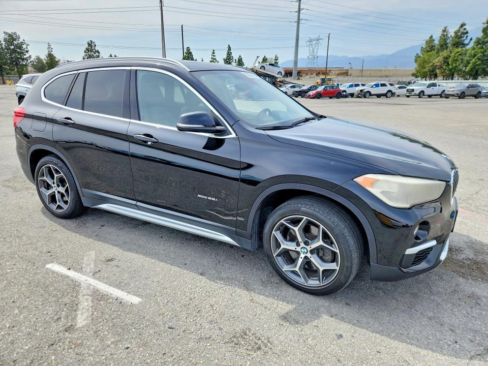 2016 BMW X1 VIN WBXHT3C36GP880188 COPART salvage auction — NORMAL WEAR, Mt - Dis/Dlr/Exp Only Clean Title, sold $3,100 on 2026-07-28 (photo 4)
