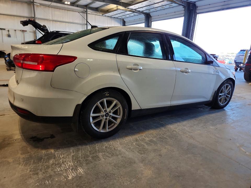 2016 Ford Focus VIN 1FADP3F27GL282188 COPART salvage auction — SIDE, Mn - Cert Of Title-Prior Salvage, sold $575 on 2026-07-09 (photo 3)