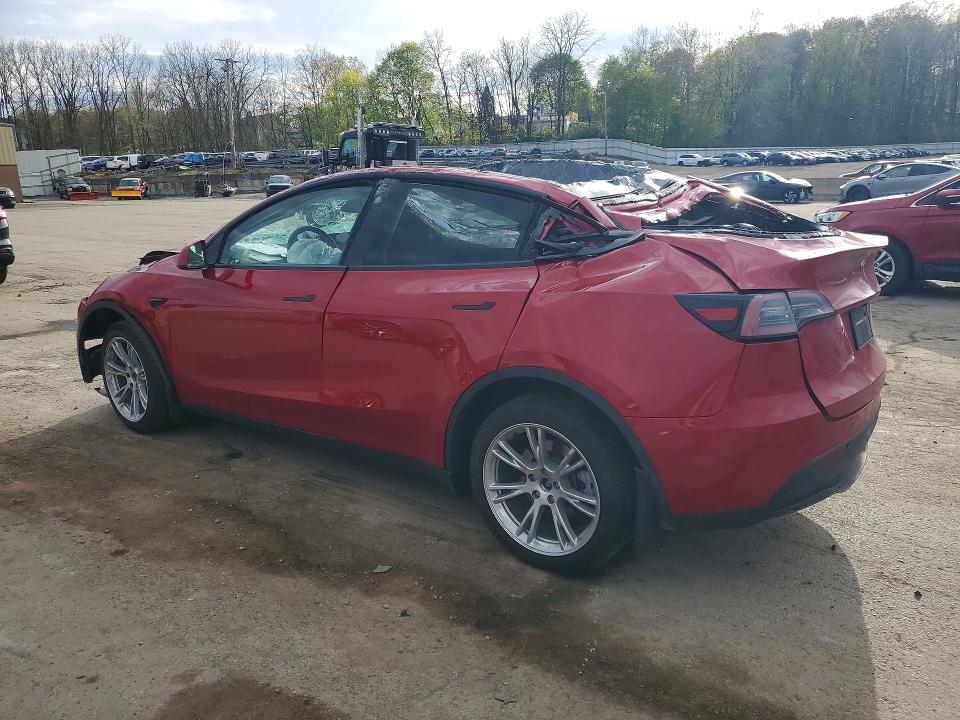 2023 Tesla Model y VIN 7SAYGDEE2PA203851 COPART salvage auction — ROLLOVER, Salvage Title, sold $3,600 on 2026-07-14 (photo 2)