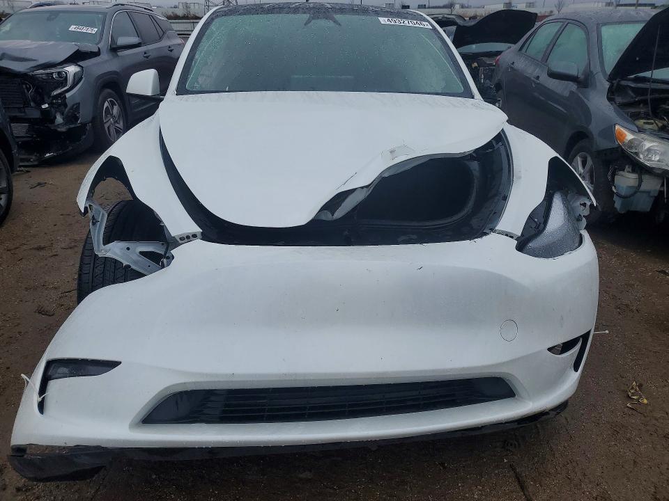2023 Tesla Model y VIN 7SAYGDEEXPF809921 COPART salvage auction — ALL OVER, Il - Salvage Certificate, sold $1,650 on 2026-07-07 (photo 5)