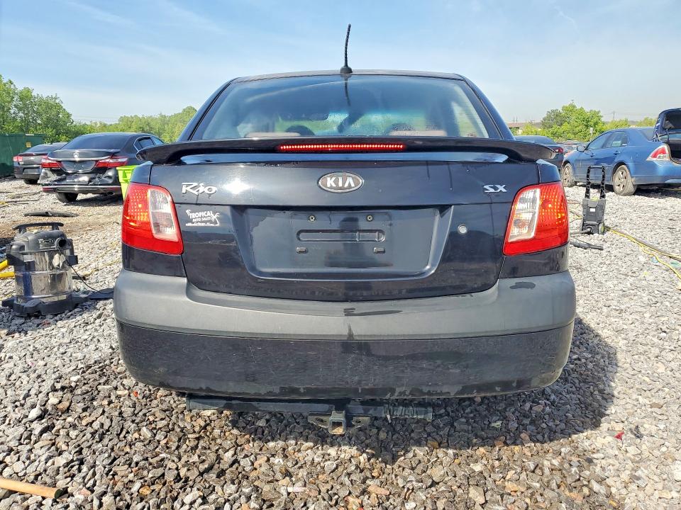 2009 Kia Rio VIN KNADE223096556726 COPART salvage auction — SIDE, Wv - Salvage Certificate, sold $225 on 2026-07-28 (photo 6)