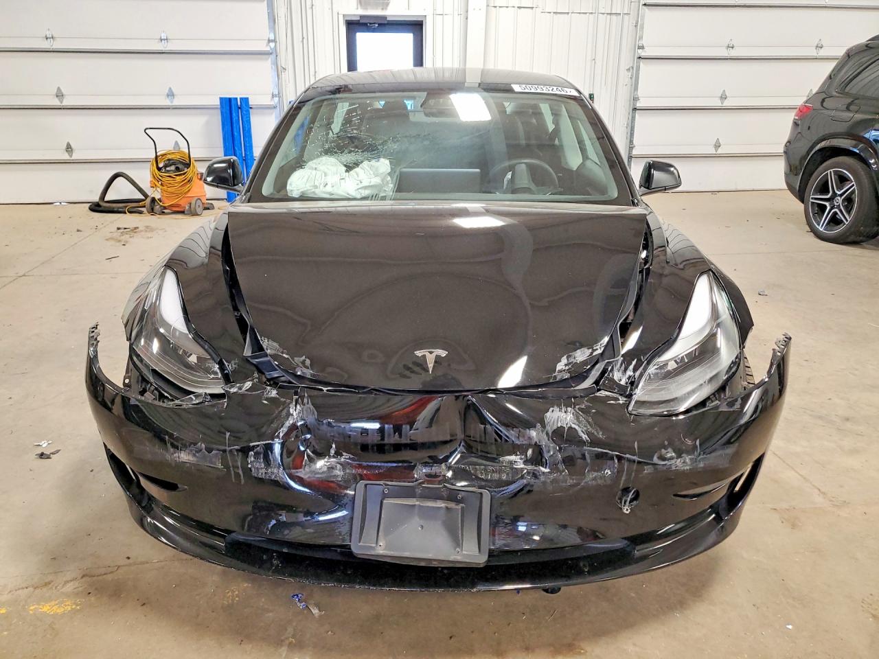 2023 Tesla Model 3 VIN 5YJ3E1EB7PF591423 COPART salvage auction — Rear End, MN - CERT OF TITLE-SALVAGE, sold $3,350 on 2026-05-28 (photo 5)