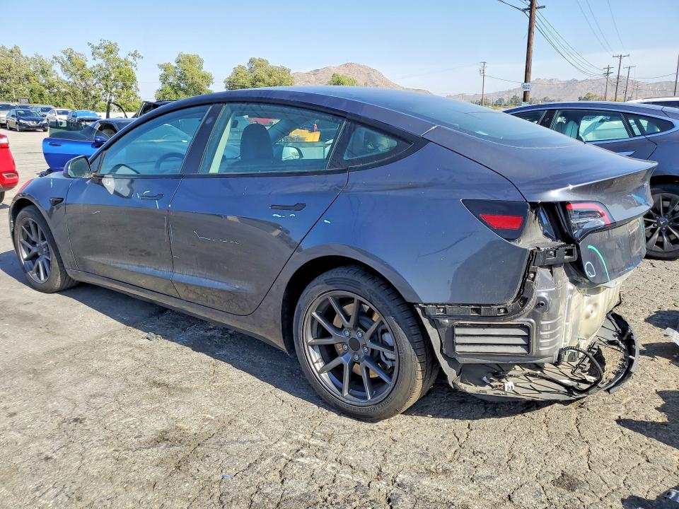 2023 Tesla Model 3 VIN 5YJ3E1EB2PF678193 COPART salvage auction — REAR END, Salvage Title, sold $9,600 on 2026-07-30 (photo 2)