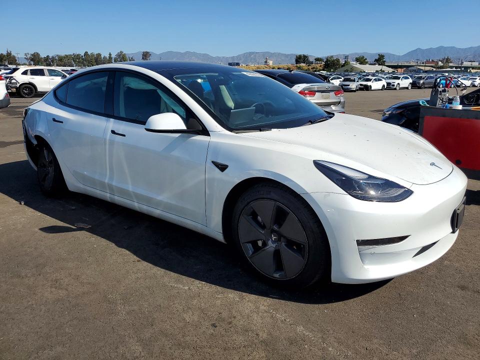 2023 Tesla Model 3 VIN 5YJ3E1EBXPF695517 COPART salvage auction — REAR END, Salvage Title, sold $9,200 on 2026-07-15 (photo 4)