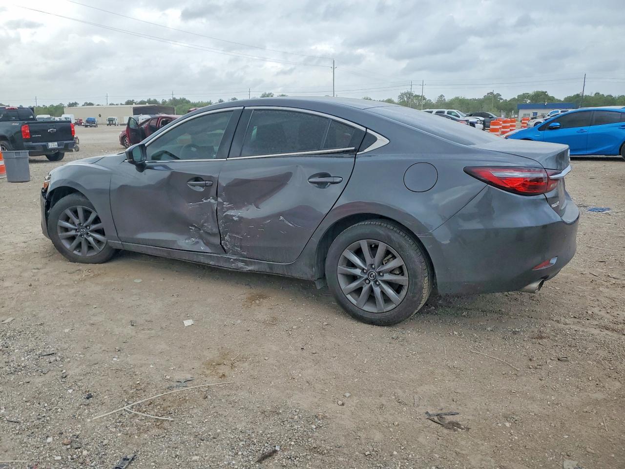 2021 Mazda 6 VIN JM1GL1UM5M1609352 COPART salvage auction — Side, TX - CERTIFICATE OF TITLE, sold $4,050 on 2026-07-09 (photo 2)
