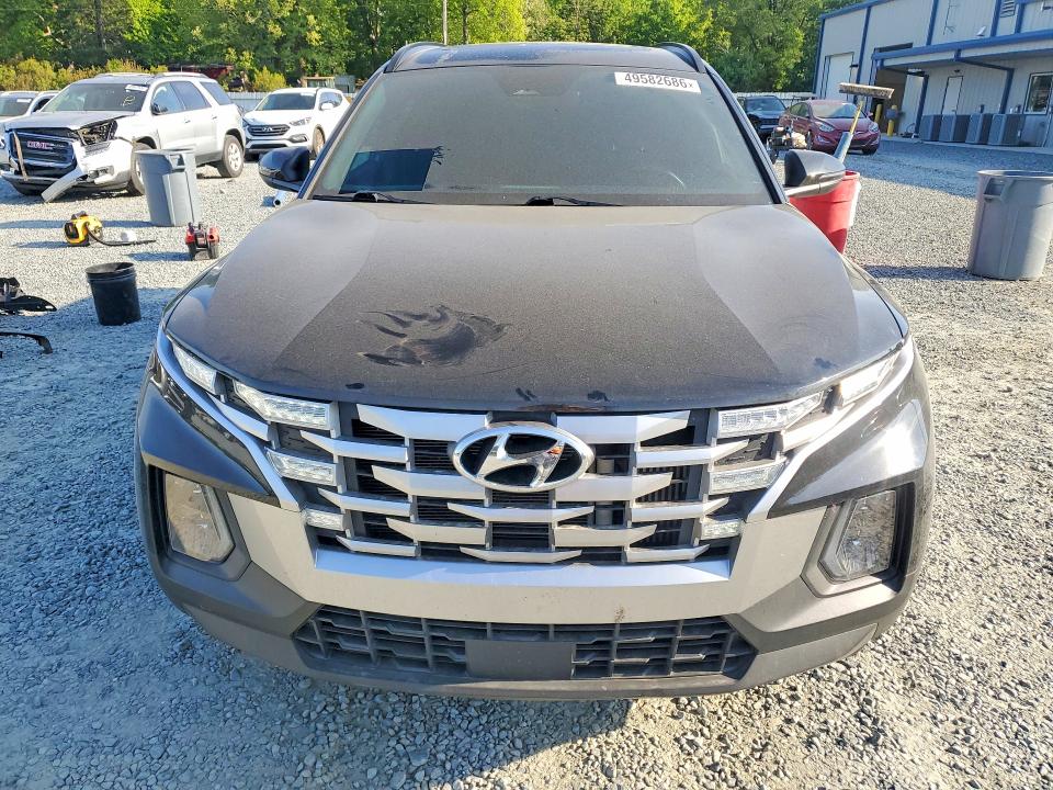 2023 Hyundai Santa cruz VIN 5NTJDDAF8PH062389 COPART salvage auction — REAR END, NC - SALVAGE CERTIFICATE OF TITLE, sold $5,400 on 2026-07-23 (photo 5)