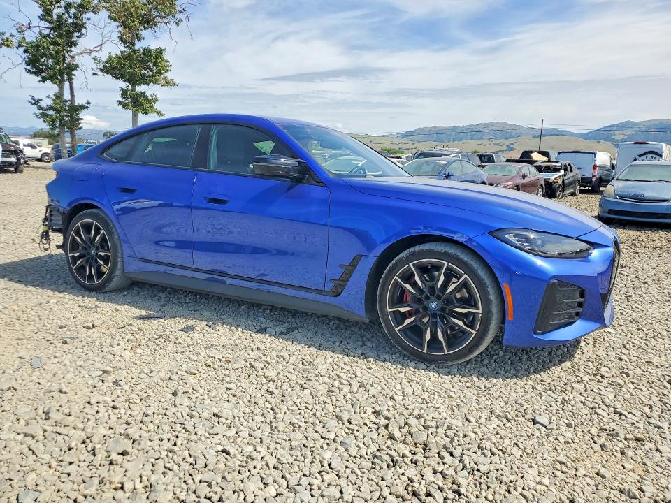 2024 BMW I4 VIN WBY33AW00RFT26519 COPART salvage auction — REAR END, Ca - Salvage Certificate, sold $27,000 on 2026-07-02 (photo 4)