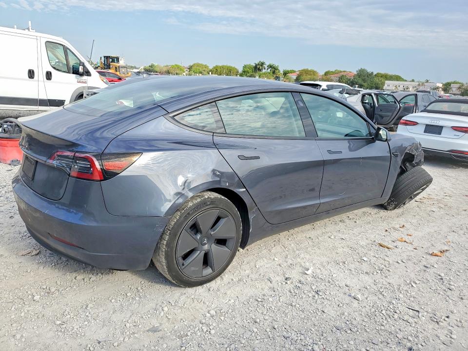 2023 Tesla Model 3 VIN 5YJ3E1EAXPF672312 COPART salvage auction — FRONT END, FL, sold $7,700 on 2026-07-24 (photo 3)