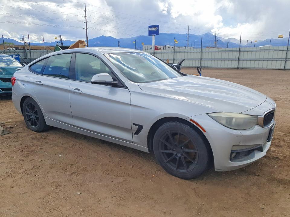 2015 BMW 3er VIN WBA3X5C52FD560078 COPART salvage auction — MINOR DENT/SCRATCHES, Tx - Dis/Dlr/Exp Only Salvage Title, sold $1,050 on 2026-07-08 (photo 4)