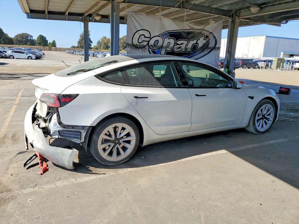 2023 Tesla Model 3 VIN 5YJ3E1EA8PF573648 COPART salvage auction — REAR END, Salvage Title, sold $8,700 on 2026-08-20 (photo 3)