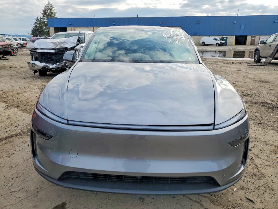 2026 Tesla Model y VIN 7SAYGDEE2TF425111 COPART salvage auction — SIDE, MI - CERT OF TITLE-SALVAGE VEHICLE, sold $19,200 on 2026-07-07 (photo 5)