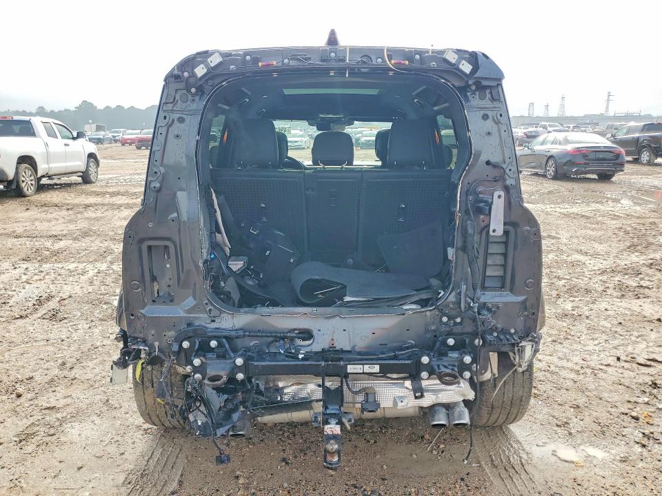 2023 Land rover Defender VIN SALEWEEE1P2194356 COPART salvage auction — REAR END, Tx - Salvage Vehicle Title, sold $40,000 on 2026-07-31 (photo 6)