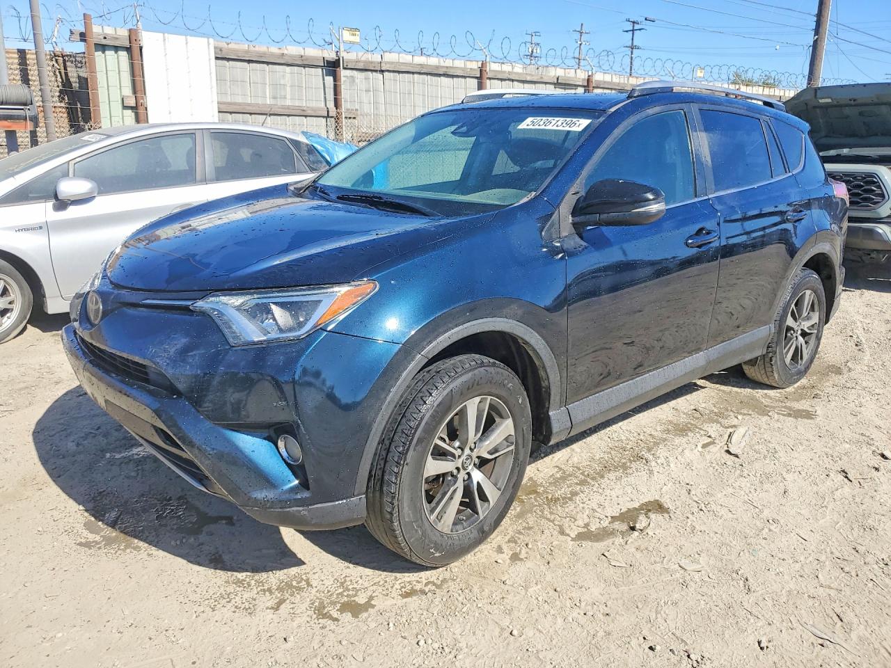 2017 Toyota RAV4 VIN JTMWFREVXHD105019 — COPART salvage auction photo