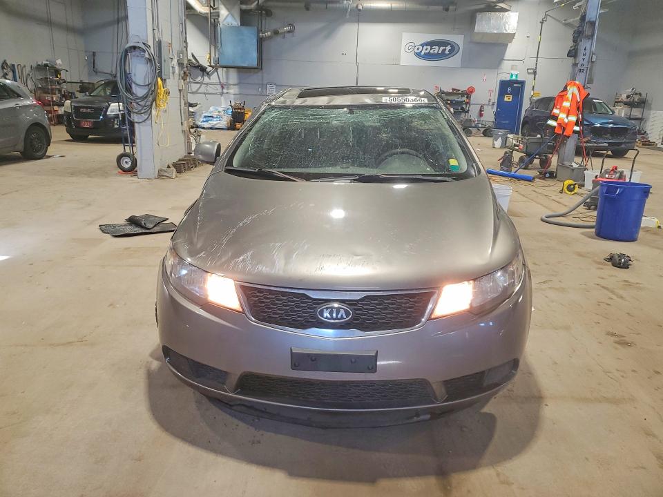 2012 Kia Forte VIN KNAFU4A25C5629067 COPART salvage auction — ROLLOVER, Salvage Title, sold $250 on 2026-07-30 (photo 5)