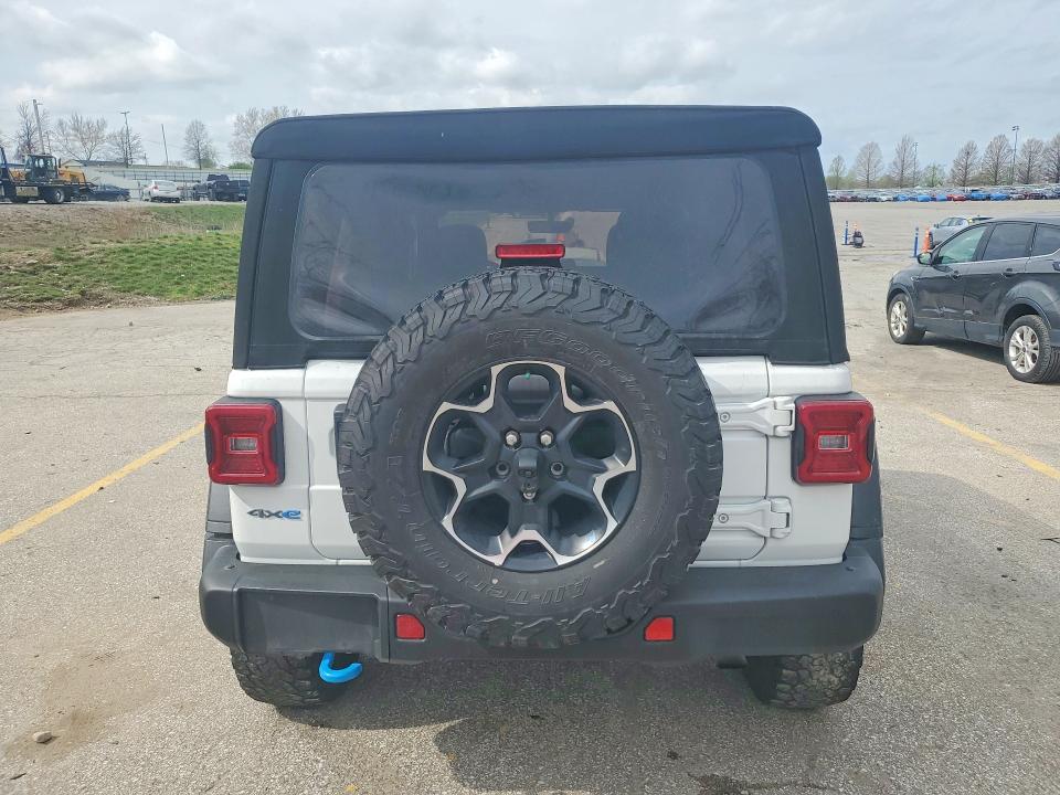 2023 Jeep Wrangler / VIN 1C4JJXR6XPW621464 COPART salvage auction — MINOR DENT/SCRATCHES, MO - CERTIFICATE OF TITLE, sold $18,300 on 2026-07-09 (photo 6)