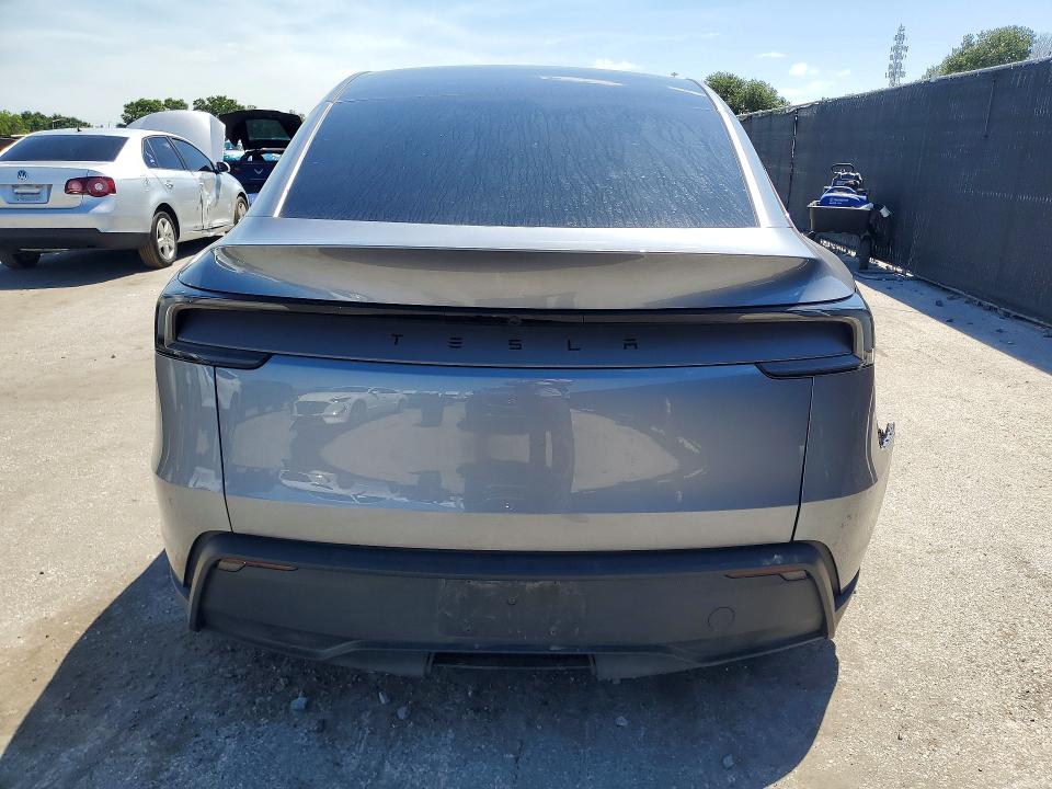 2026 Tesla Model y VIN 7SAYGDED1TA430045 COPART salvage auction — REAR END, Fl - Cert Of Title Slvg Rebuildable, sold $20,100 on 2026-07-15 (photo 6)