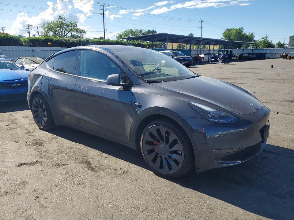 2024 Tesla Model y VIN 7SAYGDEF2RA267898 COPART salvage auction — REAR END, Ca - Salvage Certificate, sold $15,500 on 2026-07-07 (photo 4)