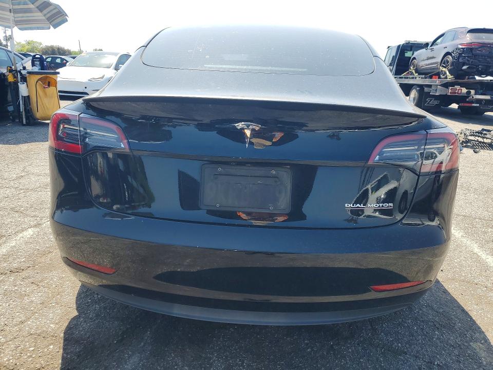 2023 Tesla Model 3 VIN 5YJ3E1EC2PF693821 COPART salvage auction — SIDE, CA - SALVAGE CERTIFICATE, sold $11,800 on 2026-07-31 (photo 6)