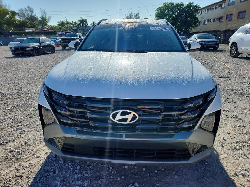 2025 Hyundai Tucson VIN 3KMJB3DE4SE019518 COPART salvage auction — SIDE, Id - Salvage Certificate Of Title, sold $9,400 on 2026-07-10 (photo 5)