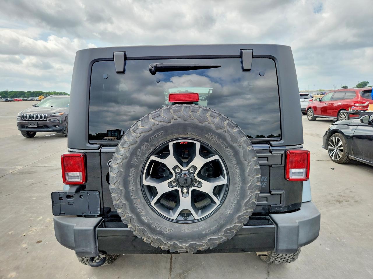 2016 Jeep Wrangler Unlimited VIN 1C4BJWDG7GL103053 COPART salvage auction — Normal Wear, TX - CERT OF TITLE-REBLT SLVG FLOOD (P), sold $7,900 on 2026-07-03 (photo 6)