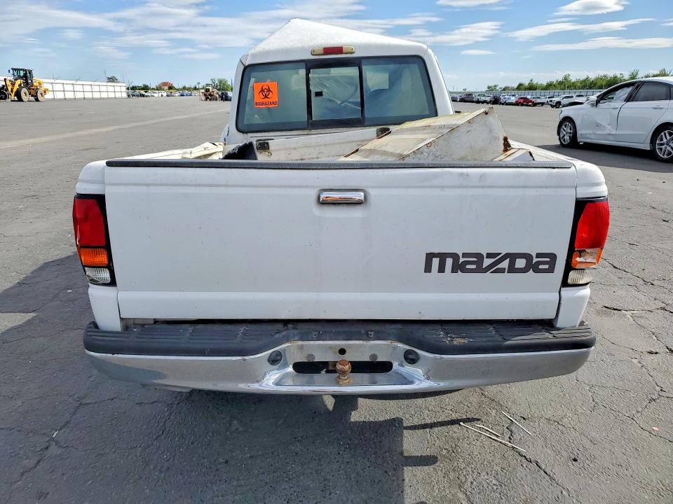 1997 Mazda VIN 4F4CR16A5VTM34758 COPART salvage auction — SIDE, Ca - Non-Repairable Vehicle Cert, sold $200 on 2026-07-02 (photo 6)