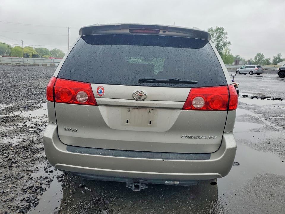 2009 Toyota Sienna VIN 5TDZK22C29S265470 COPART salvage auction — FRONT END, OR - SALVAGE TITLE CERTIFICATE, sold $525 on 2026-07-27 (photo 6)
