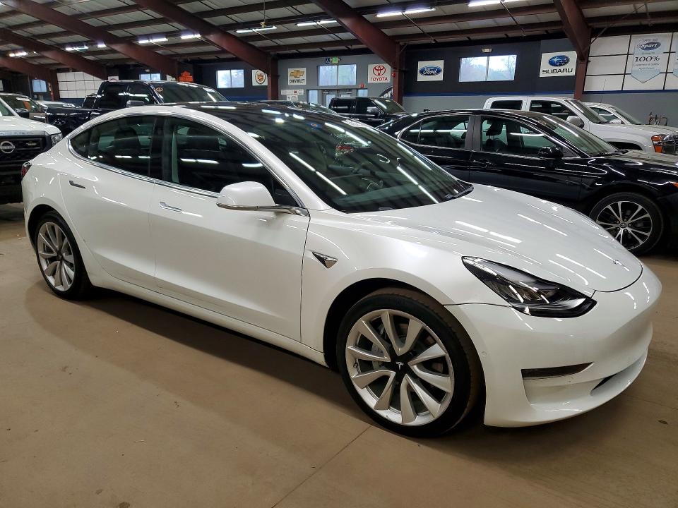 2019 Tesla Model 3 VIN 5YJ3E1EAXKF417507 COPART salvage auction — MINOR DENT/SCRATCHES, Me - Cert Of Title-Rebuilt Vehicle, sold $7,600 on 2026-07-30 (photo 4)