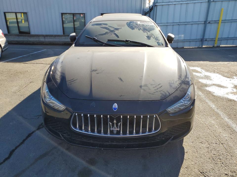 2014 Maserati Ghibli VIN ZAM57RTA9E1085914 COPART salvage auction — SIDE, Fl - Dis/Dlr/Exp Only Clean Title, sold $2,100 on 2026-07-31 (photo 5)