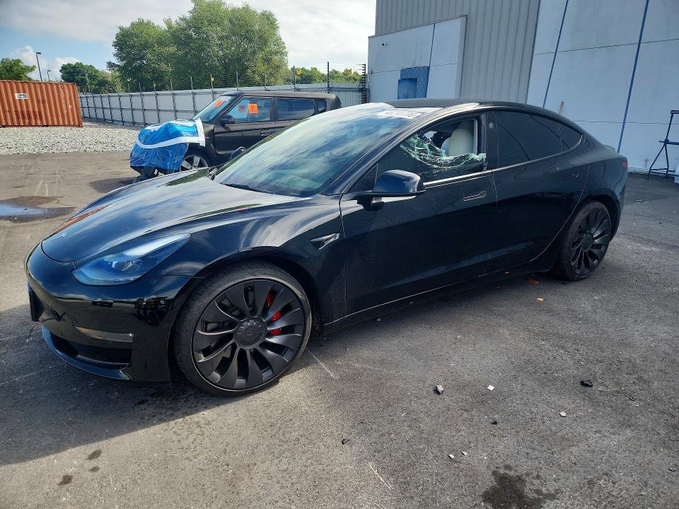 2023 Tesla Model 3 VIN 5YJ3E1EC2PF582671 COPART salvage auction — SIDE, FL, sold $7,900 on 2026-07-27 (photo 1)