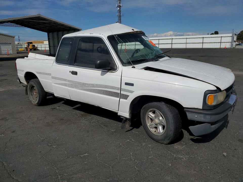 1997 Mazda VIN 4F4CR16A5VTM34758 COPART salvage auction — SIDE, Ca - Non-Repairable Vehicle Cert, sold $200 on 2026-07-02 (photo 4)