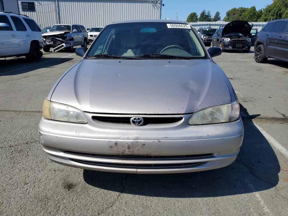 1999 Toyota Corolla VIN 1NXBR12E1XZ221974 COPART salvage auction — MINOR DENT/SCRATCHES, Ca - Dis/Dlr/Exp Only Clean Title, sold $325 on 2026-07-10 (photo 5)