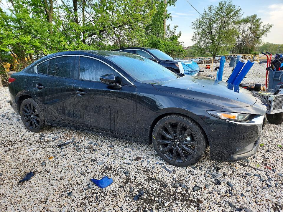 2025 Mazda 3 VIN JM1BPABM7S1756044 COPART salvage auction — SIDE, Md - Cert Of Salvage > 75% Damage, sold $1,650 on 2026-07-23 (photo 4)