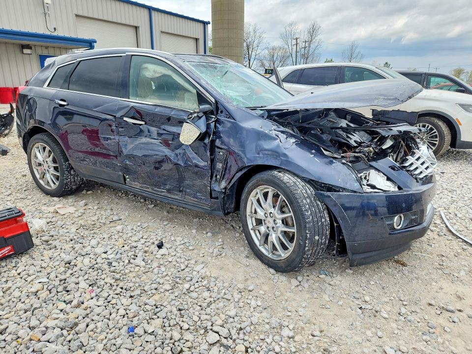 2014 Cadillac Srx VIN 3GYFNFE31ES583433 COPART salvage auction — ROLLOVER, MI - CERTIFICATE OF TITLE, sold $300 on 2026-07-02 (photo 4)