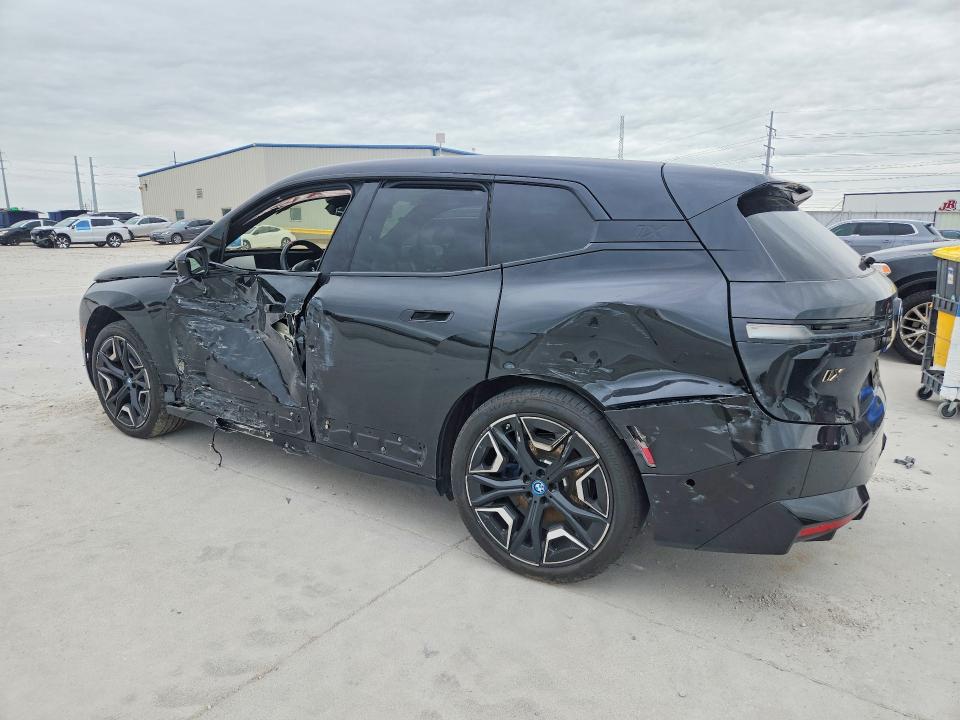 2025 BMW Ix VIN WB533CF00SCT39190 COPART salvage auction — SIDE, Tx - Certificate Of Title, sold $28,250 on 2026-07-28 (photo 2)