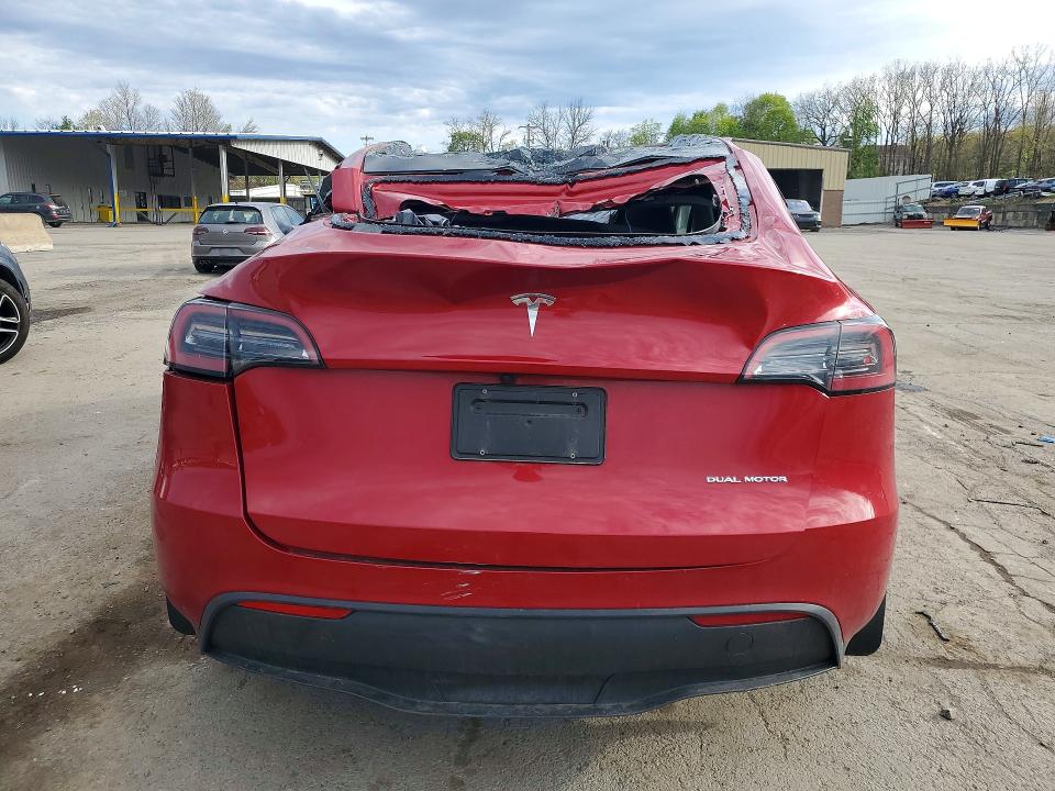 2023 Tesla Model y VIN 7SAYGDEE2PA203851 COPART salvage auction — ROLLOVER, Salvage Title, sold $3,600 on 2026-07-14 (photo 6)